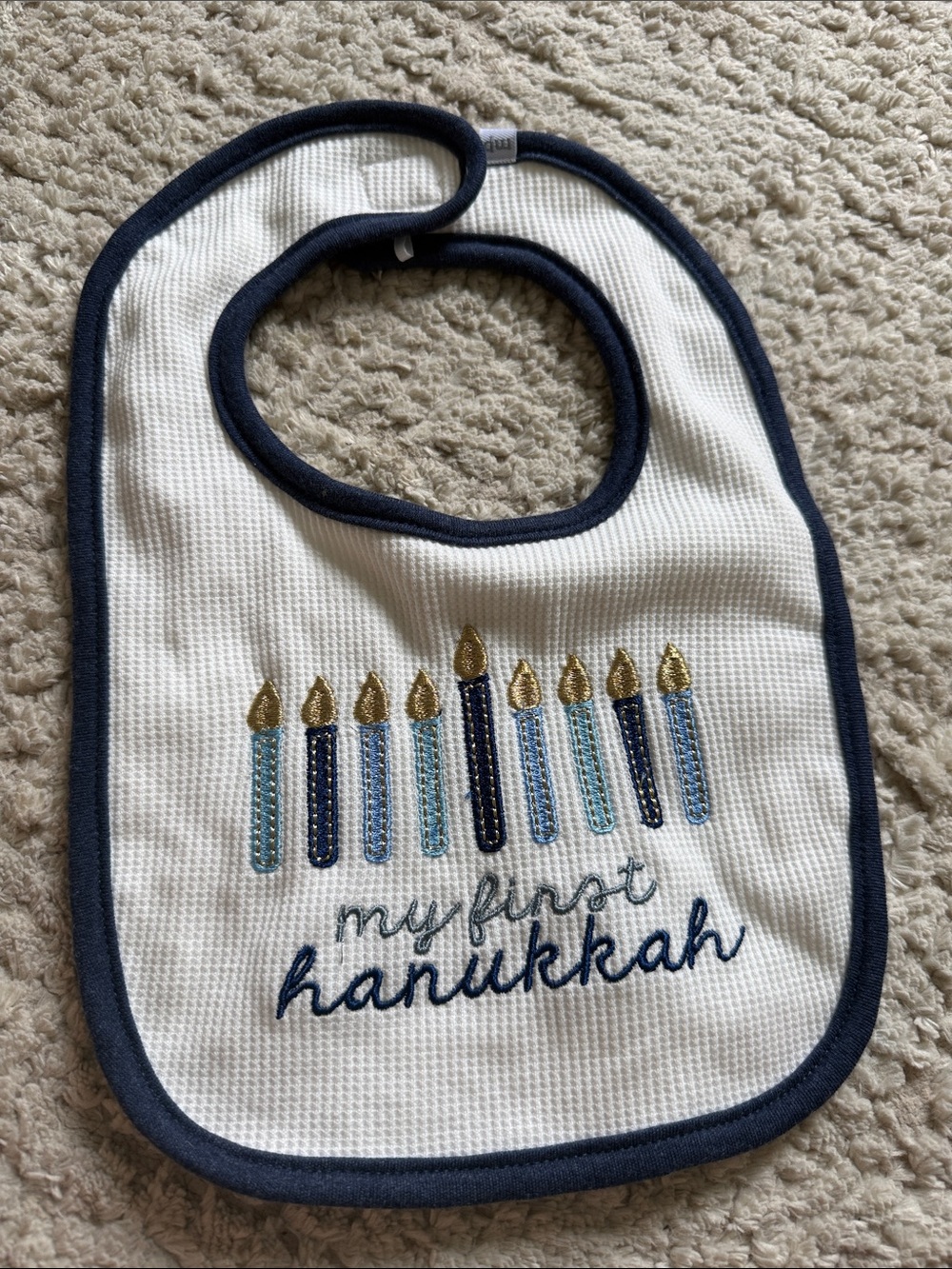 Mud Pie White Bib with Navy Trim and Gold Candle Accents